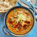 Konkan Chicken Curry in a bowl in Potyo Restaurant